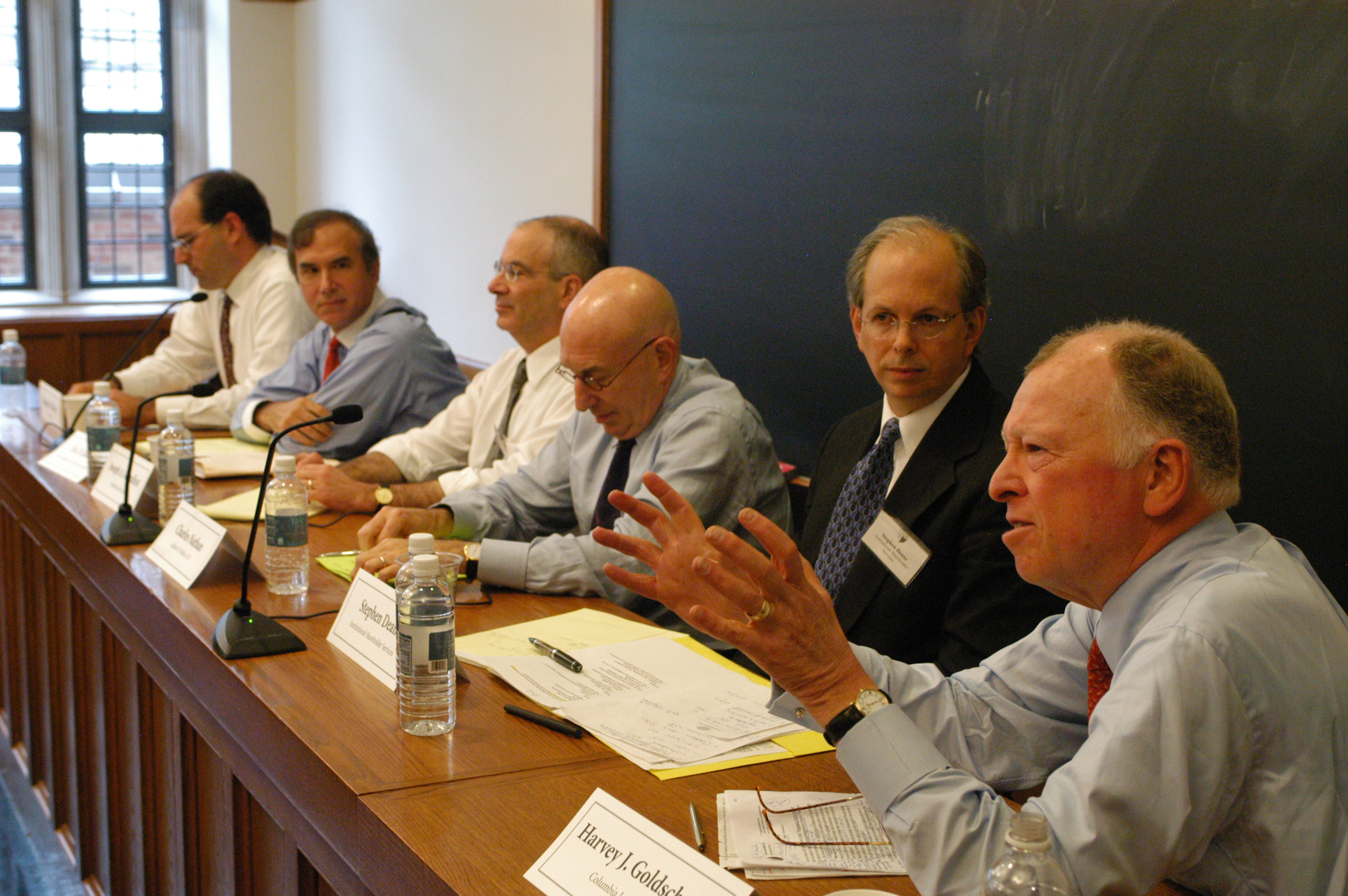 Damon Silvers, Eric Roiter, Stanford Law Prof. Joseph Grundfest, Charles Nathan &#039;65, Stephen Deane, and Columbia Law Prof. Harvey Goldschmid