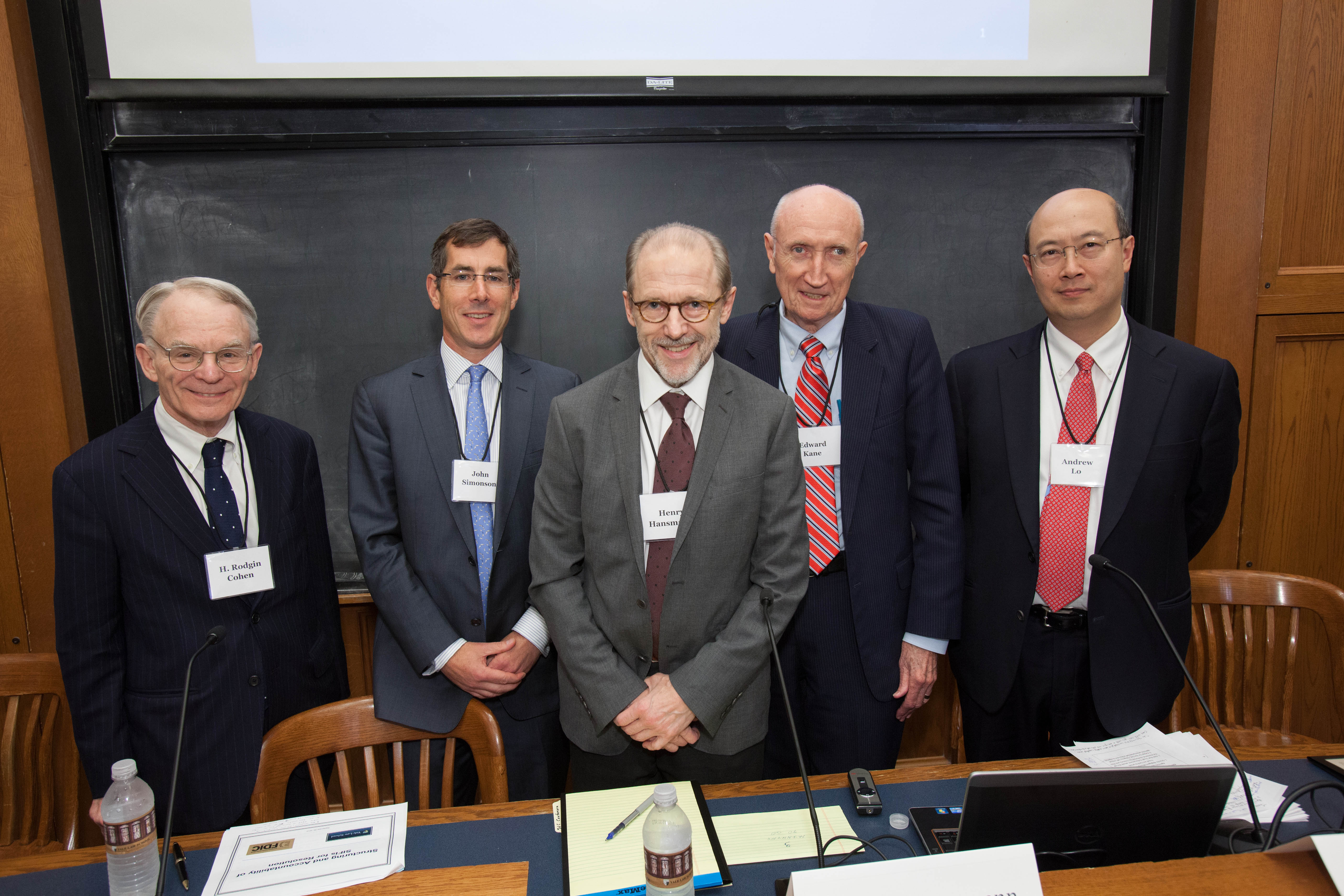 H. Rodgin Cohen, John F. Simonson, YLS Prof. Henry Hansmann ’74, Boston College Finance Prof. Edward J. Kane, and MIT Sloan Prof. Andrew W. Lo