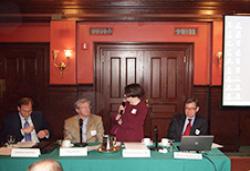 (From left) Charles W. Calomiris, Gary B. Gorton, Roberta Romano '80, and Michael Woodford '80